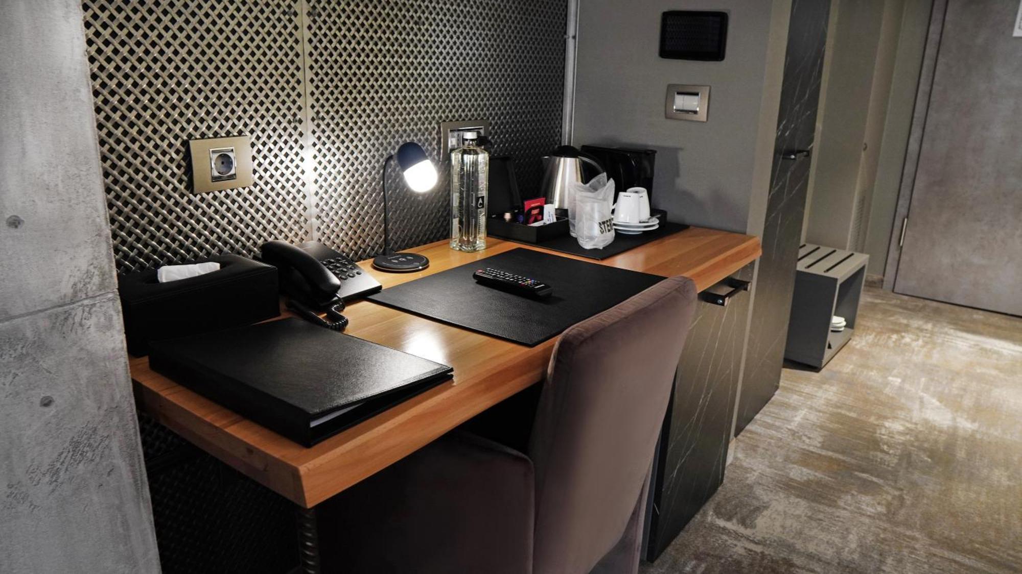 Aniroc Signature Hotel Arad Exterior photo A Nespresso machine in a hotel room